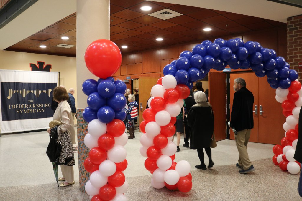 FSO lobby with patriotic balloon arch before a concert